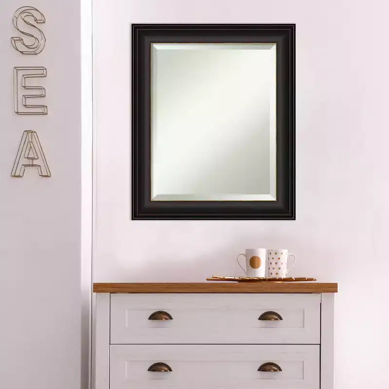 Specchio da parete con cornice color bronzo brunito